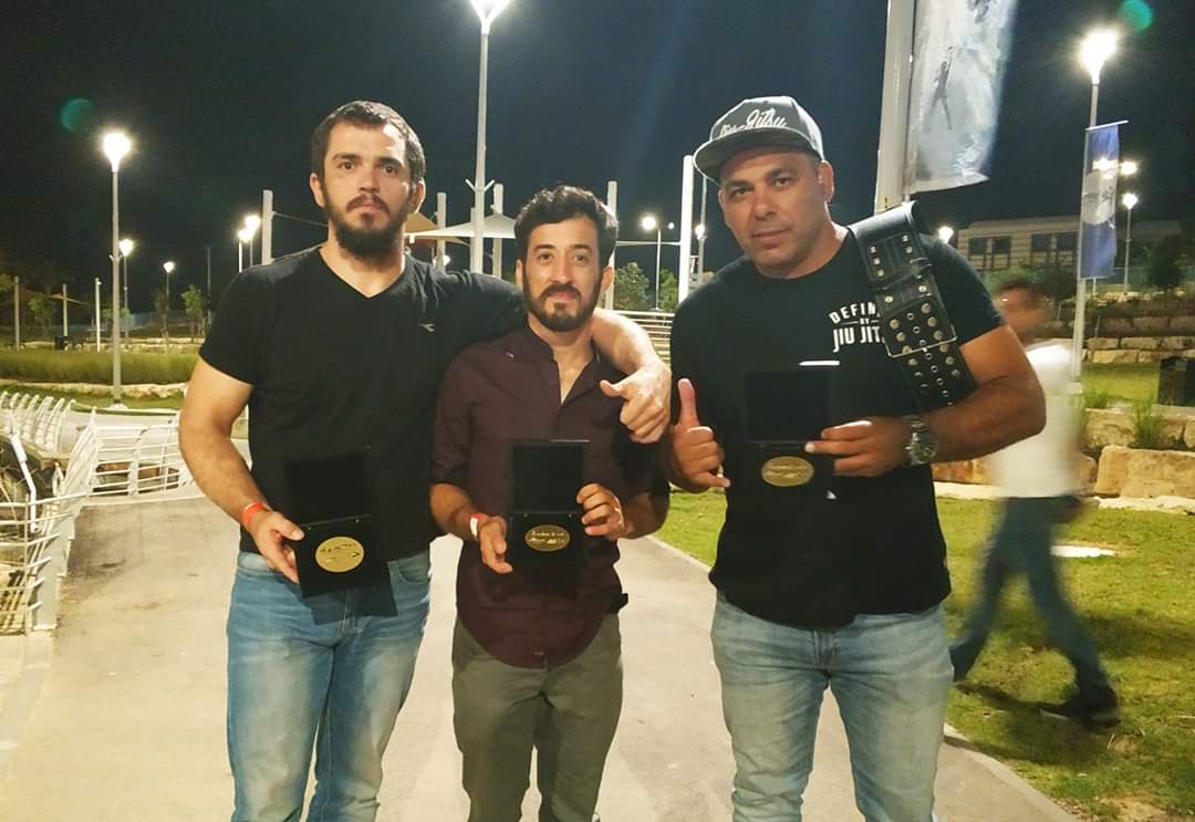 מימין: המאמן פיני חדידה, משה דאלי וסלבה אנטיפנקו, בטקס מצטייני הספורט בבאר שבע