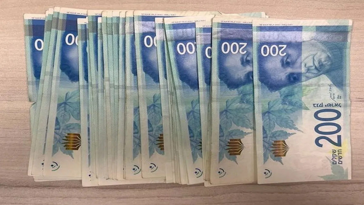''אוגרים דולרים, מפחדים שהממשלה תבטל את שטר ה-200 שקלים''