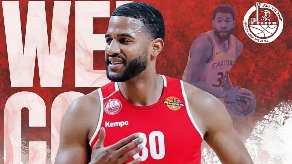 ליונל פיגרואה ג'וניור במדי קבוצת כדורסל, במהלך משחק, מבצע זריקה לסל - המחשה להחתמה החדשה של הפועל באר שבע דימונה