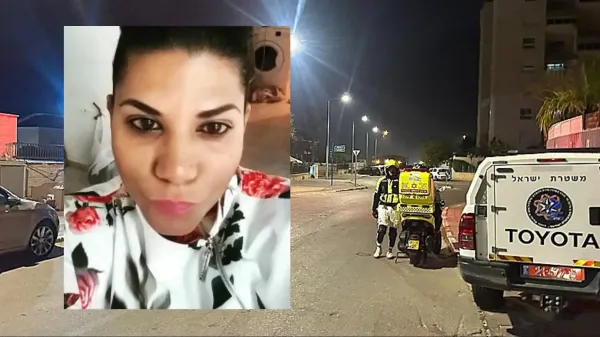 ניידות משטרה ואמבולנס בזירת רצח בבאר שבע לאחר אירוע אלימות במשפחה.