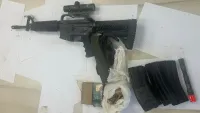 נשק מסוג M-16, מחסניות ותחמושת שנתפסו בפעילות משטרתית בערערה בנגב.