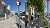 הדמיית AI של רחוב בבאר שבע לאחר שדרוג עירוני עם עצים, הצללה, ספסלים ומרחב ציבורי נעים יותר לתושבים.
